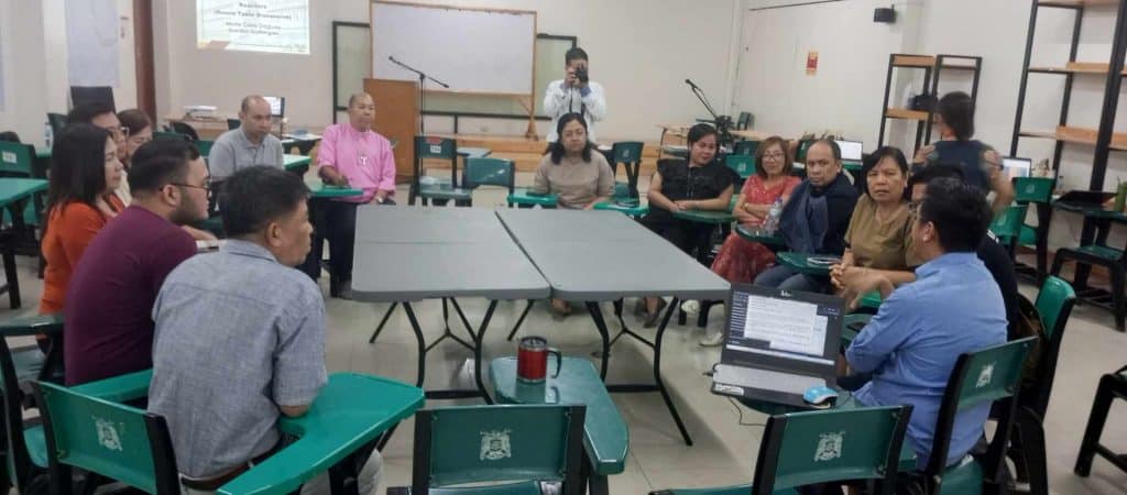 a group of people sitting in a room